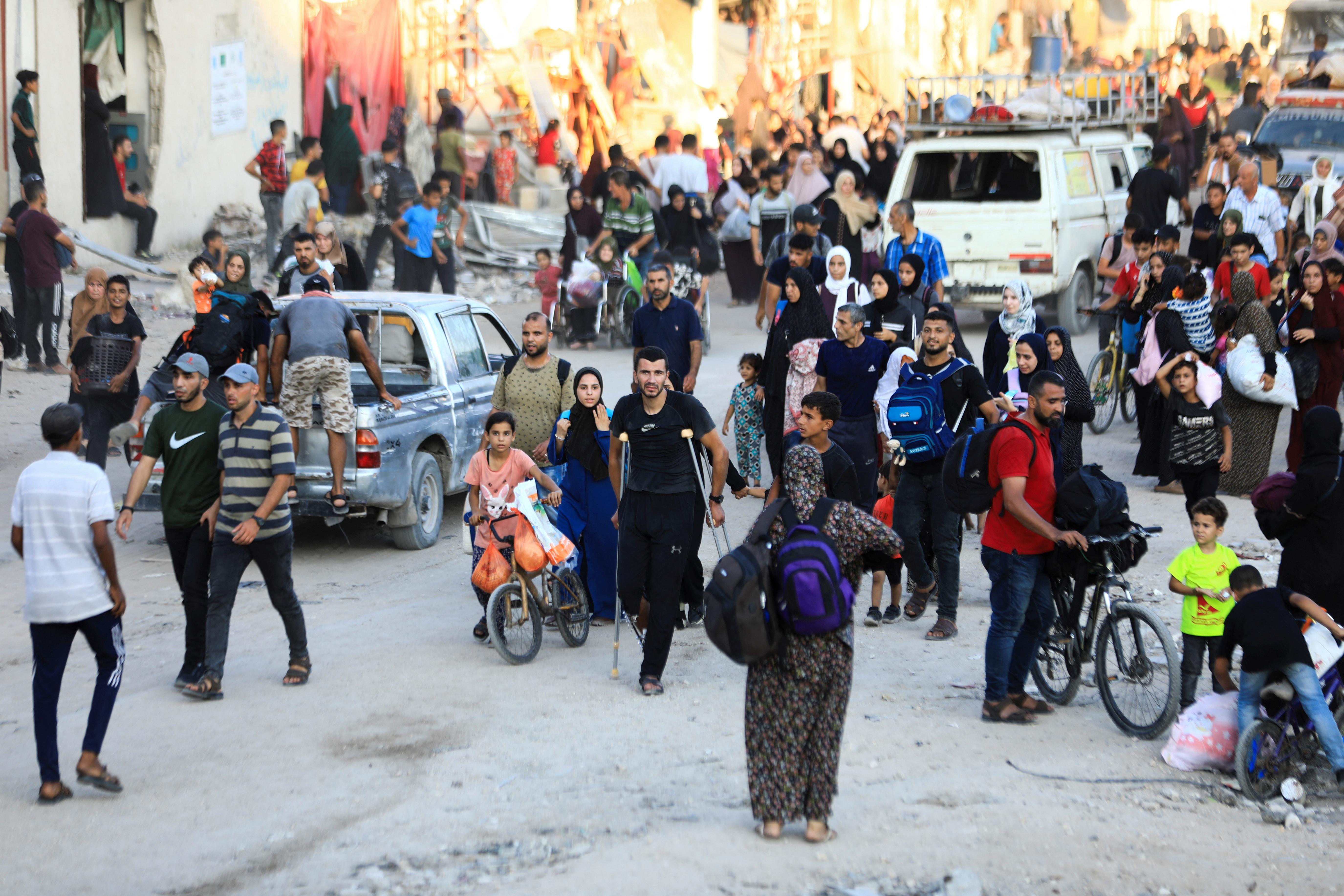 Palestinians, who fled the eastern part of Gaza City after they were ordered by Israeli army to evacuate their neighborhoods